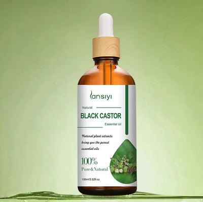Huile essentielle Ricin noir 100 % pure et naturelle sur fond vert, parfaite pour renforcer et revitaliser les cheveux.