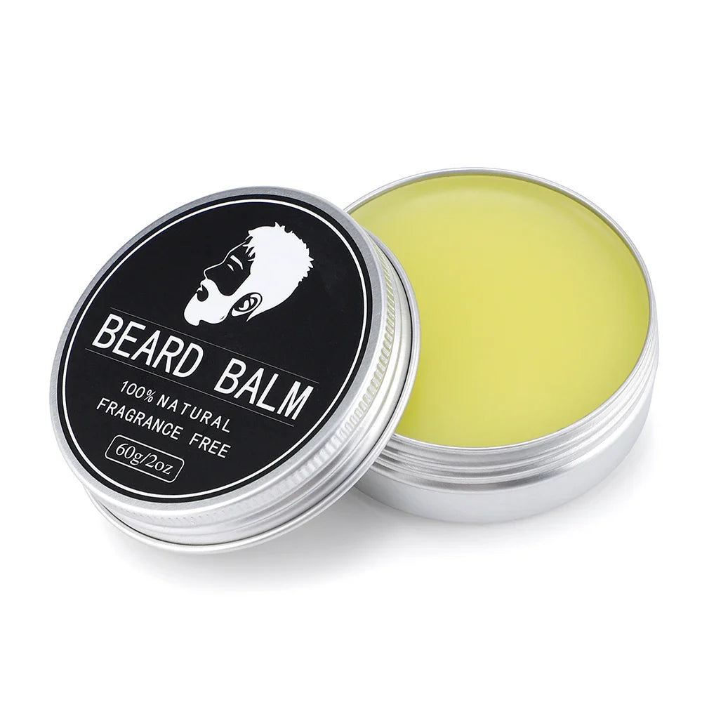 Crème Croissance des cheveux pour barbe dans une boîte métallique ouverte, texture jaune naturelle, soin sans parfum pour homme.